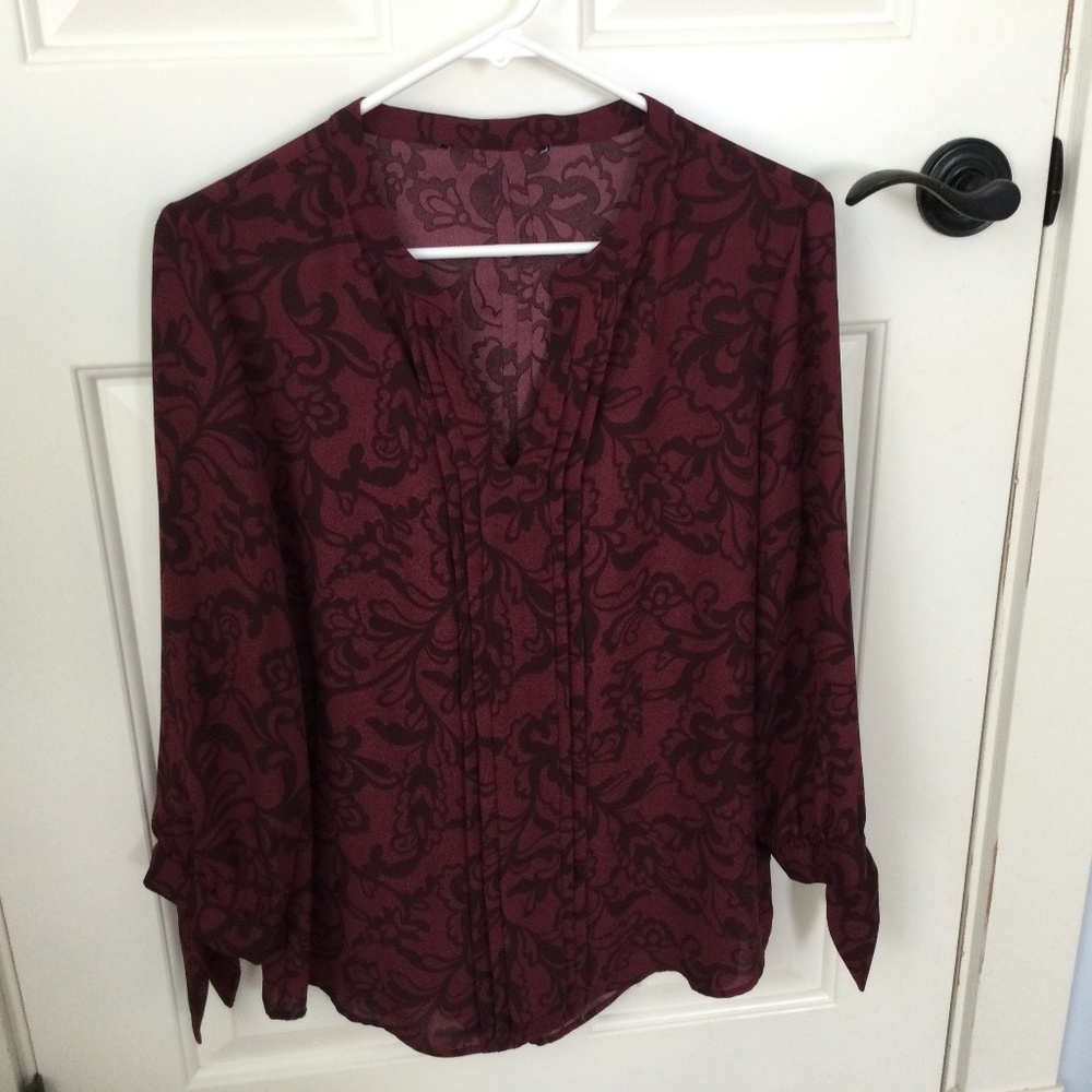 Burgundy blouse with muted pattern